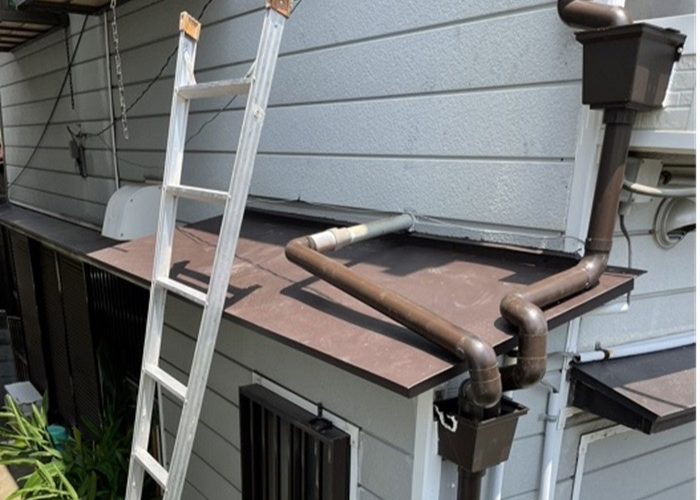 尼崎市　貼り替え工事後のガルバリウム鋼板庇屋根