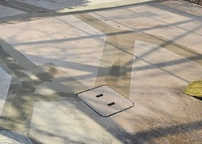 市川町にお住まいの方へ姫路市で行ったガレージ土間のひび割れ補修を行った後の様子