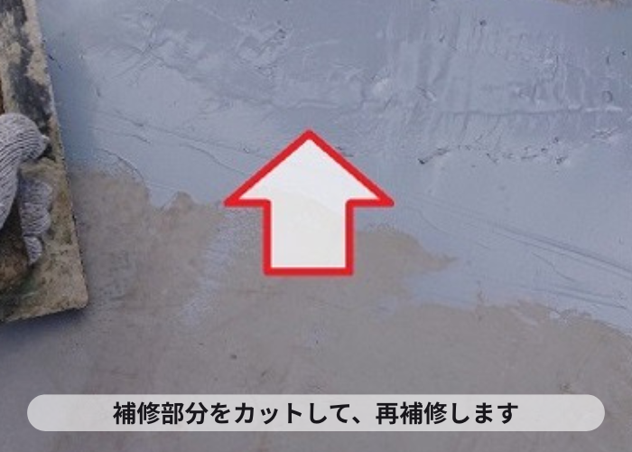 尼崎市　塩ビシート防水の膨れを再補修している様子