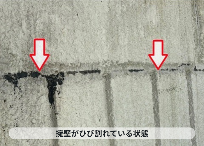 宝塚市　擁壁のひび割れ補修工事を行う現場の様子