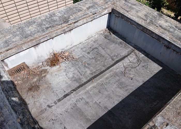 尼崎市　陸屋根防水工事として塩ビシートを貼る前のゴムシート防水